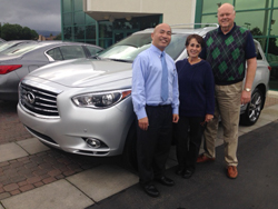 Pat Kolstad, far right, turned his winning raffle ticket into a new luxury SUV.