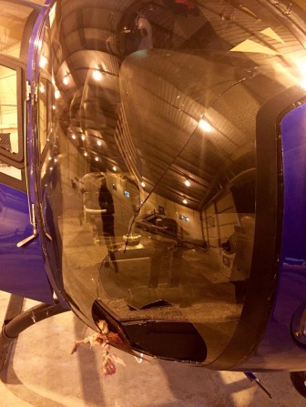 A bird smashed through the windhsield of the Airbus EC120B, leaving a hole and long crack. (Photo courtesy of SJPD)