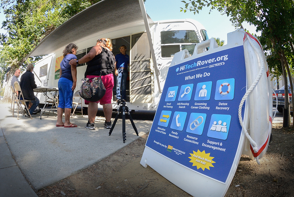 Karen Addato's High-Tech Rover has become a mobile intake center, connecting people with social services to pull them off the streets. (Photo by Greg Ramar)