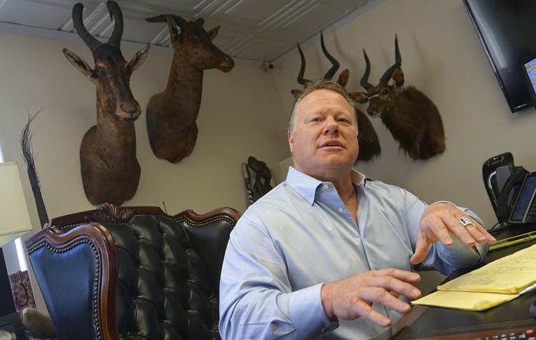 Jeffrey Stanley of Bad Boys Bail Bonds has turned his office into a big game hunting trophy room. (Photo by Jennifer Wadsworth)