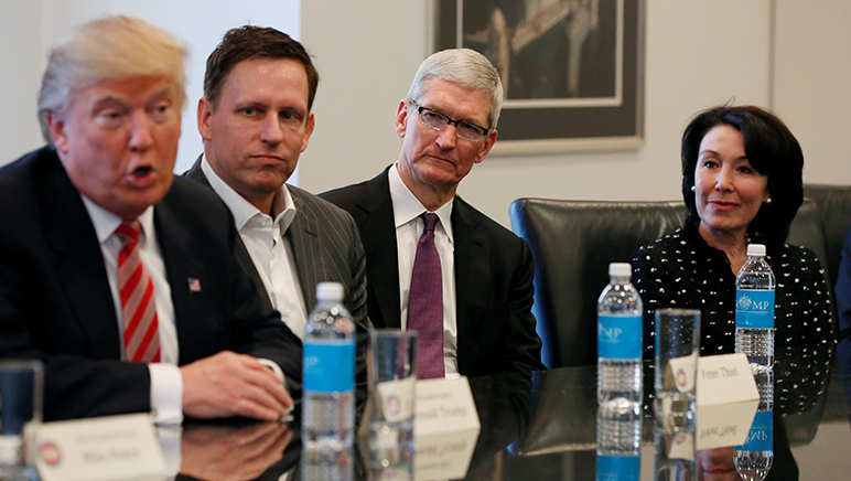 President-elect Donald Trump speaks as PayPal co-founder and Facebook board member Peter Thiel, Apple Inc CEO Tim Cook and Oracle CEO Safra Catz look on during a meeting with technology leaders at Trump Tower. (Photo by Shannon Stapleton, via Reuters)
