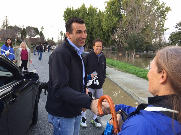 San Jose Mayor Sam Liccardo visited with residents in Naglee Park the day of the flood but had little info to share. (Photo by Dan Pulcrano)