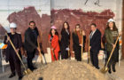 Community leaders hold shovels at the La Placita groundbreaking.